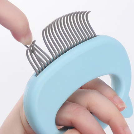 Cat grooming massage comb handle grip design for comfortable daily pet care use