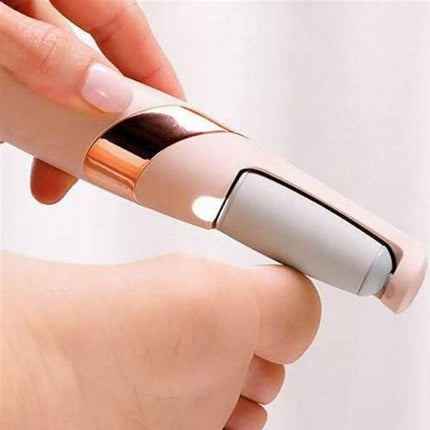 Electric foot file in use removing dead skin from heel