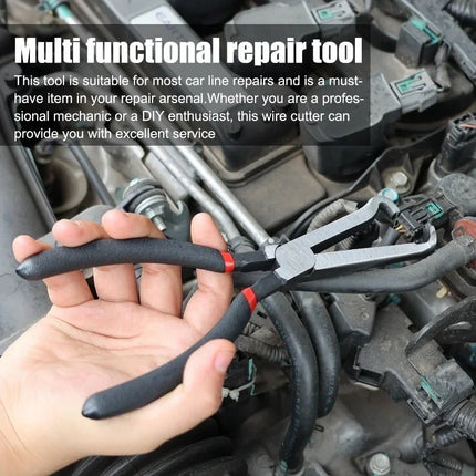 Electrical disconnect pliers set in use removing automotive wire connector
