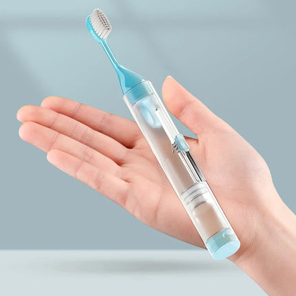 Portable 3 in 1 toothbrush close-up of brush head and tongue scraper feature
