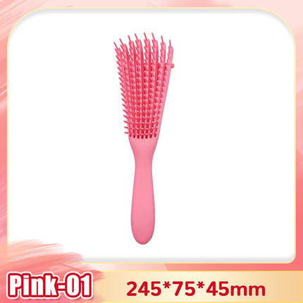 Hair detangling brush in use on long thick hair without breakage