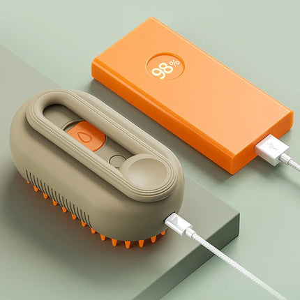 3 in 1 Cat Steam Brush in use on cat coat for grooming