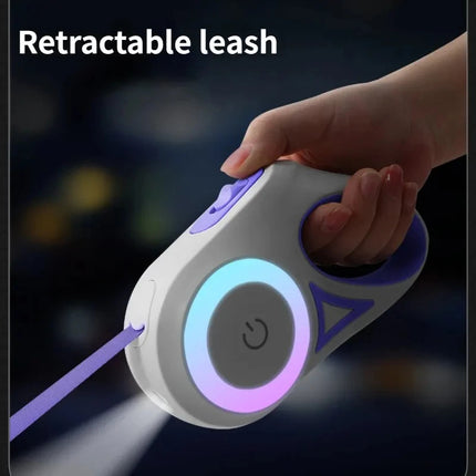 Automatic retractable luminous dog leash in use during nighttime walk with pet
