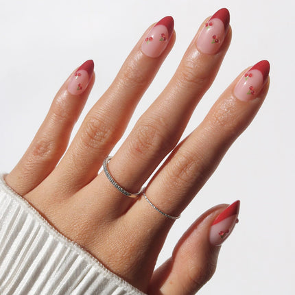 Cherry Bomb Short Almond Press-On Nails with Red French Tips