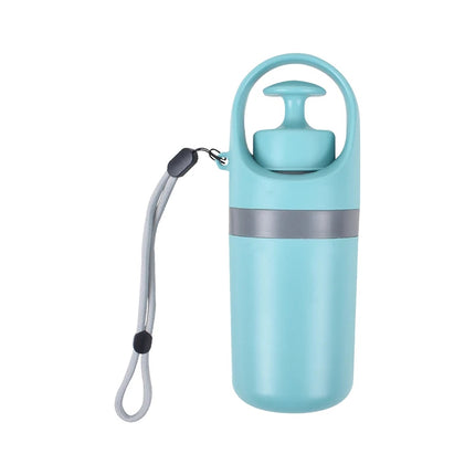 Portable dog poop scooper in use demonstrating one-handed no-bend operation