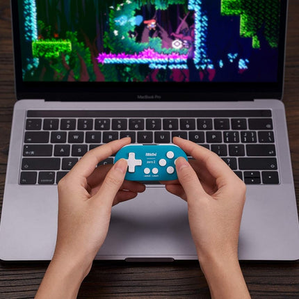 Turquoise Keychain-Sized Bluetooth Mini Controller
