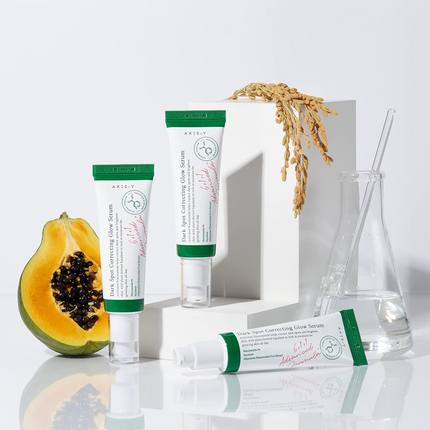 AXIS-Y Dark Spot Correcting Glow Serum texture and application on skin closeup