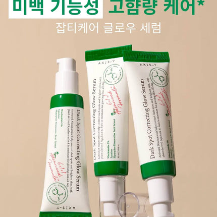 AXIS-Y Dark Spot Correcting Glow Serum bottle with dropper on clean background